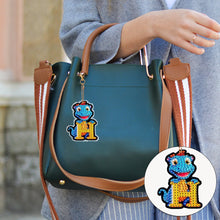 Load image into Gallery viewer, 7PCS Double Sided Diamond Painting Art Keychain Pendant (Dinosaur 26 Letters #2)
