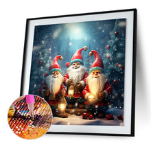Load image into Gallery viewer, Diamond Painting - Full Round - Three Santa Clauses next to the Christmas tree (30*30CM)

